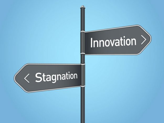 Will your business evolve or become extinct? innovation-stagnation sign